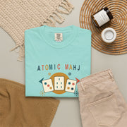 Front view of the blossom pink Atomic Mahj Mahjong shirt with a multicolor retro tile graphic.