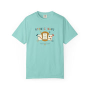 Folded white Atomic Mahj Comfort Colors shirt showing the retro Mahjong tile print in a styled product view.