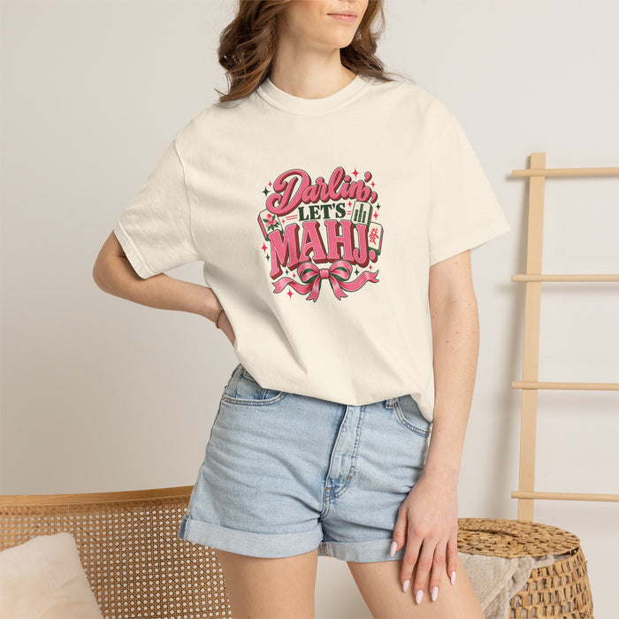 Model wearing the Ivory Darlin’ Let’s Mahj Comfort Colors mahjong shirt with pink lettering, tiles, and bow